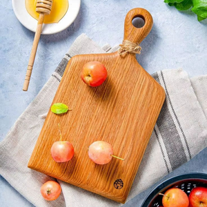 Planche à découper robuste en bois d'acacia naturel, conçue pour trancher le pain, découper la viande et couper les fruits. - Product Image 1