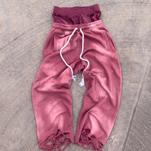 Pantalon de survêtement rose déchiré pour homme, taille élastique avec cordon de serrage, style streetwear décontracté, tricoté effet usé, collection automne - Product Image 1