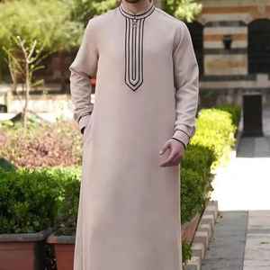 Túnica Tradicional Árabe para Hombre, Abaya de Poliéster Sólido, Mangas Largas, Bolsillos, Estilo Casual Étnico, Jubba con Cuentas, Elástico en Cuatro Direcciones - Product Image 1
