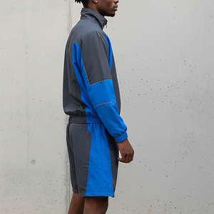 Ensemble de jogging deux pièces en nylon et polyester sur mesure OEM/ODM, avec empiècements color block, coupe-vent, tendance, pour homme - Product Image 2