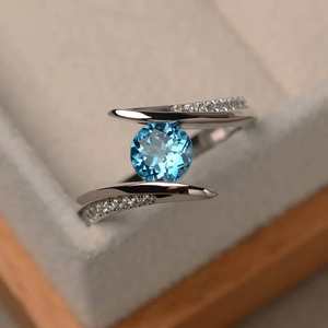 Bague de fiançailles en argent sterling 925 avec topaze bleue et zircon taille brillant, sertie pavé, pour fêtes et mariages, bijoux de luxe - Product Image 1
