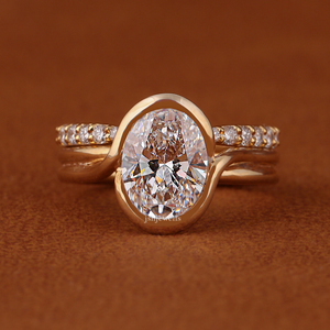 Bague de fiançailles sertie de diamants de laboratoire ovales de 3 carats, monture en or jaune 14 carats, solitaire assorti à une alliance de mariage - Product Image 1