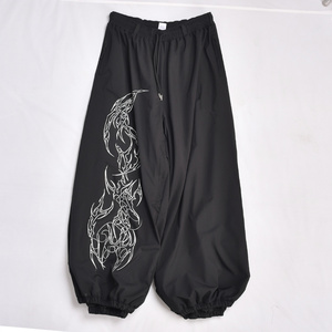 Pantalones Holgados Negros Unisex con Estampado Tribal de Dragón Blanco, Cintura con Cordón Ajustable, Transpirables, de Poliéster, Estilo Adulto - Product Image 1