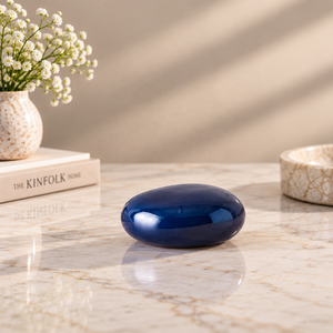 Sculptural Keepsake Urn Blue Metal Pebble Design Glossy Finish Compact <b>Memorial</b> Ashes Holder with Contemporary <b>Form</b> - Product Image 1