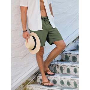 กางเกงขาสั้นลำลองผู้ชายแบบมีเชือกผูกเอว 7 นิ้ว สำหรับฤดูร้อน มีกระเป๋า ไซส์ XXS สีเข้ม ลายเทคนิค สไตล์สปอร์ต พร้อมโลโก้ - Product Image 3