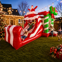 Structure gonflable commerciale de Noël avec toboggan aquatique, thème Père Noël, pour événements et entreprises de location