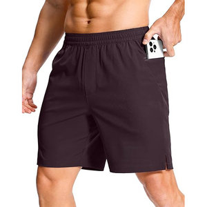 Pantalones cortos deportivos para hombre con franjas reflectantes en las aberturas de las piernas para seguridad nocturna, bolsillo oculto con cremallera en la cintura y ajuste atlético. - Product Image 1
