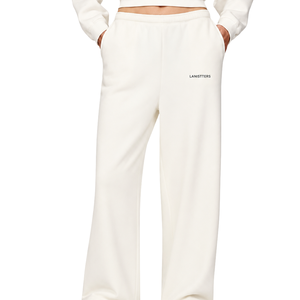 Pantalones de chándal de forro polar para mujer, de pierna ancha, color crema, con cintura elástica, ajuste holgado, suaves, informales, para invierno, con bolsillos - Product Image 1