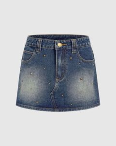 Mini-jupe en jean de luxe cloutée pour femme, style punk, avec rivets, fabrication OEM sur mesure, fabricant de jean au Royaume-Uni et aux États-Unis - Product Image 1