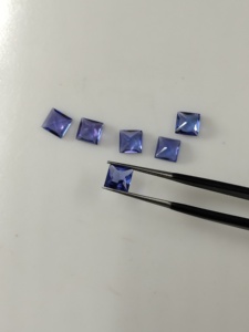 พลอยแทนซาไนต์สีน้ำเงินม่วงธรรมชาติขนาด 5.5 มม. รูปทรงสี่เหลี่ยมเจียระไนแบบ Step Cut คุณภาพพรีเมียม สำหรับทำเครื่องประดับ ได้รับการรับรอง - Product Image 1