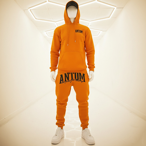 Ensemble de survêtement d'hiver orange personnalisé avec lettres imprimées en relief, sweat à capuche et pantalon de jogging assorti, streetwear décontracté respirant pour homme 100% - Product Image 1