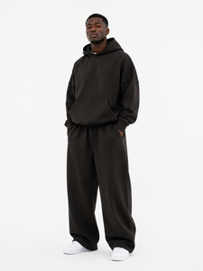 Ensemble de survêtement noir à capuche pour homme 100% coton, coupe ample, sweat-shirt et pantalon décontractés avec cordon de serrage et poches latérales - Product Image 1