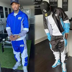 ชุดวอร์มผ้าไนลอนกันลมสำหรับผู้ชายชุดวอร์มผ้าโพลีเอสเตอร์เย็บปะแนวสตรีทชุดวอร์มแบบมีซิปสำหรับผู้ชาย - Product Image 1