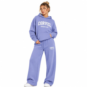 Sudadera con capucha oversize de algodón premium con gráfico de letras universitarias en arco de color liso para mujer, pantalones deportivos de pierna ancha, MOQ bajo - Product Image 1