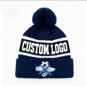 Wholesale Custom Logo <b>Cold</b> Pom Pom Beanie Hat Ribbed Knit Cuffed Acrylic Soccer Football Sports <b>Fan</b> Embroidered <b>Hot</b> Headwear Cap - Product Image 1