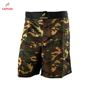 Shorts MMA de haute qualité, écologiques, légers, avec tissu respirant, logo sur le devant, coupe confortable - Product Image 1
