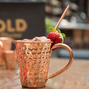 Copper cocktail serving mug set for refined evening hosting hammered finish metal cups durable reusable party mugs - Product Image 4