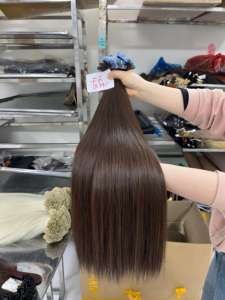 Extensions de cheveux humains bruns foncés - Ruban adhésif invisible de qualité supérieure - Cheveux russes slaves du Vietnam - Cuticules alignées - Tendance du moment - Product Image 2