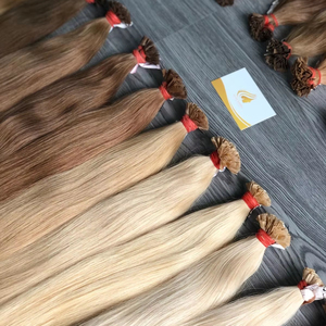 Precio al por mayor Extensiones de cabello Remy 100% con cinta adhesiva, cabello humano vietnamita de color claro, material virgen con cutícula pre-organizada, 8-32 pulgadas - Product Image 1