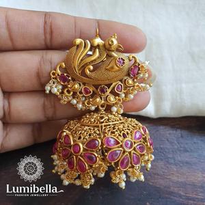 Peacock Style Large Matte Brass Jhumka Earrings with Pearl and Heart Stud - Product Image 1