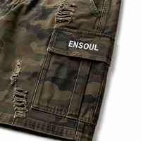 Shorts cargo en jean camouflage imprimé intégral, taille mi-haute, 100% coton, avec poches utilitaires, brodés et déchirés, personnalisés par le fabricant