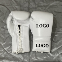 Fabrication en usine de gants de boxe personnalisés avec logo, en cuir véritable, à lacets, pour entraînement professionnel de kickboxing, pour adultes.