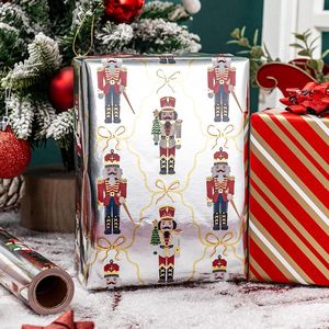 Rollo de Papel de Regalo Navideño Plateado Metálico con Diseño de Lazos de Cascanueces y Rayas, Papel de Regalo Reversible para la Temporada Festiva - Product Image 1