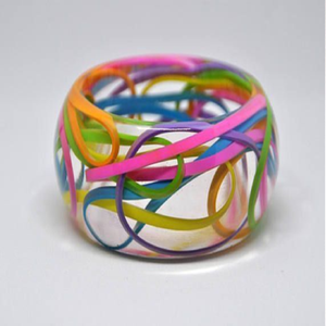 Pair of delicate <b>clear</b> <b>resin</b> bangles filled with rich pink flower petals and gold flakes, available at wholesale prices. - Product Image 2