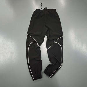Pantalon de jogging ample coupe décontractée en nylon personnalisé pour homme, coupe-vent, avec bande réfléchissante, devant plat, style streetwear, broderie OEM - Product Image 3