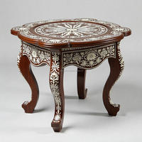Table élégante artisanale pour une décoration intemporelle du salon et de la chambre à coucher, design complexe en incrustation d'os, ronde, en bois, moderne