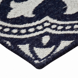 Tapis moderne en laine noir et ivoire à motif floral quadrifoliaire, antidérapant et écologique, pour salon, chambre et intérieurs d'hôtel - Product Image 5