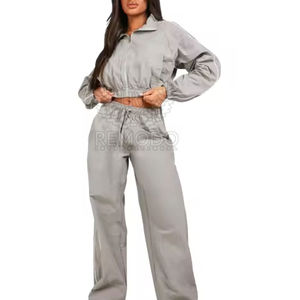 Conjunto Deportivo Personalizado Unisex de 2 Piezas, Chaqueta Deportiva con Cierre y Pantalones de Nylon, Traje Deportivo Cortavientos para Hombre y Mujer - Product Image 1