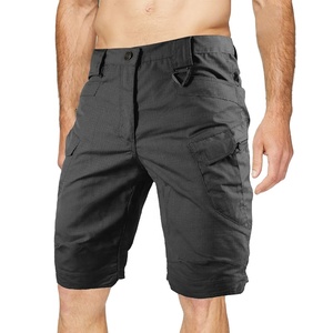 Shorts cargo décontractés noirs unis pour hommes, taille mi-haute, séchage rapide, en tissu de laine infroissable, style workwear, longueur Bermuda, taille élastique - Product Image 1