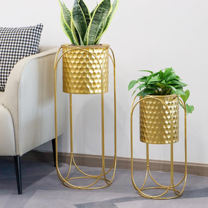 Set of 2 Large Gold Metal Planters with Stands Modern Indoor Outdoor Flower <b>Pots</b> 26 and 18 Inch <b>Tall</b> for Living Room Corner - Product Image 1