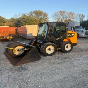 Cargadora compacta JCB de servicio pesado para construcción con potente rendimiento para manejo de materiales, paisajismo y trabajos en terrenos. - Product Image 4