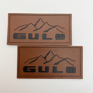 Patch en cuir personnalisé avec logo de marque |   Étiquette en PU découpée au laser de précision pour vêtements techniques et sacs de luxe |   Usine OEM professionnelle - Product Image 4
