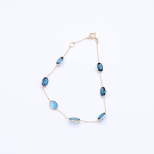 Pulsera de Cadena con Topacio Azul de Londres Ovalado Natural y Engaste de Bisel en Oro Amarillo Sólido de 18K al por Mayor - Joyería Fina Memoria Jewels - Product Image 1
