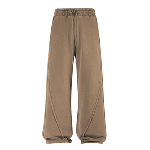 Pantalones Deportivos Personalizados para Hombre, 430 g/m², 100% Algodón Lavado, Estilo Urbano Holgado con Diseño de Empalmes, Color Sólido - Product Image 1