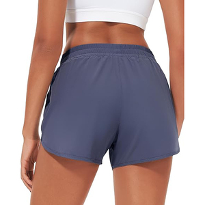 Shorts de sport pour femme en polyester respirant bleu acier, taille haute, avec ourlet incurvé, pour la course, l'entraînement et le yoga - Product Image 2