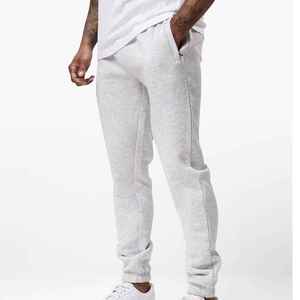 Pantalon de survêtement gris pour homme, taille élastique, poches latérales, respirant, tricoté, décontracté, pour le printemps, en coton mi-lourd - Product Image 1