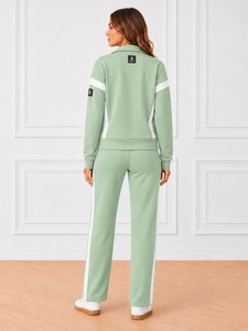 Chándal para mujer hecho de tela ligera y cómoda, perfecto para entrenamiento físico, uso casual al aire libre y diario. - Product Image 3
