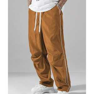 กางเกงแทร็คทรงหลวมสไตล์สตรีทแวร์สำหรับผู้ชาย พิมพ์ลายปักแบบกำหนดเอง ผู้ผลิต OEM - Product Image 4