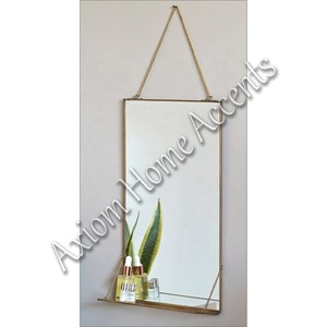 Miroir mural géométrique en métal au design élégant, idéal pour la décoration moderne du salon ou du bureau par Axiom Home Accents - Product Image 3