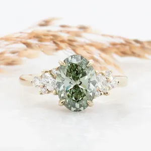 Green Oval Cut <b>Ring</b> with Marquise Side Stones in Solid Yellow Gold | Elegant Luxury Diamond Engagement Style <b>Statement</b> Jewelry - Product Image 1