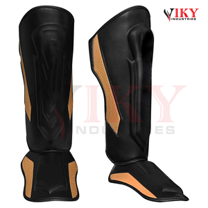 Protège-tibias et protège-pieds en cuir perforé noir et or robustes pour le sparring professionnel des arts martiaux mixtes et la protection au kickboxing - Product Image 2