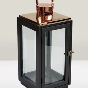 Portavelas Decorativo para el Hogar, Farol de Metal y Vidrio con Acabado Negro y Oro Rosa, Hecho a Mano y Personalizado - Product Image 1