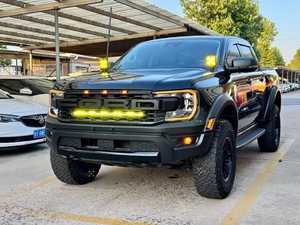 Pick-up Ford Raptor noir avec éclairage LED et pneus tout-terrain, modèle WI, délai de livraison d'échantillon de 7 jours - Product Image 1