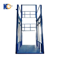 Prix d'usine Guide Rail Cargo Lift Ascenseurs électriques personnalisables Structure en acier à haute résistance Entraînement hydraulique multi-tension pour