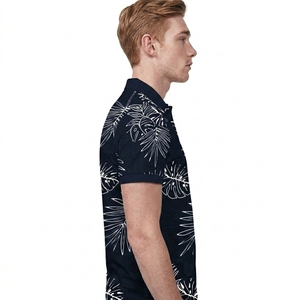 เสื้อโปโลแขนสั้นสีน้ำเงินกรมท่าสำหรับผู้ชาย พิมพ์ลายใบไม้เขตร้อนสีขาวด้วยเทคนิค Sublimation ผ้าฝ้ายอ๊อกซ์ฟอร์ดแบบลำลอง ระบายอากาศได้ดี - Product Image 2