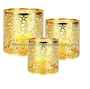 Top tendance nouveau Style Design métal bougie pots thé lumière votive thé lumière support pour la décoration de la maison pour l'exportation de l'inde - Product Image 1